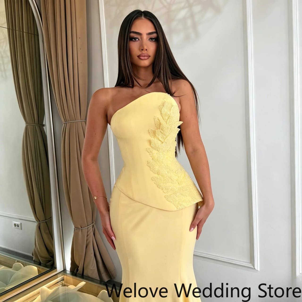 Bright Yellow Formal Evening Gown featuring a sleek strapless design, an asymmetrical neckline and a fitted corset-style bodice