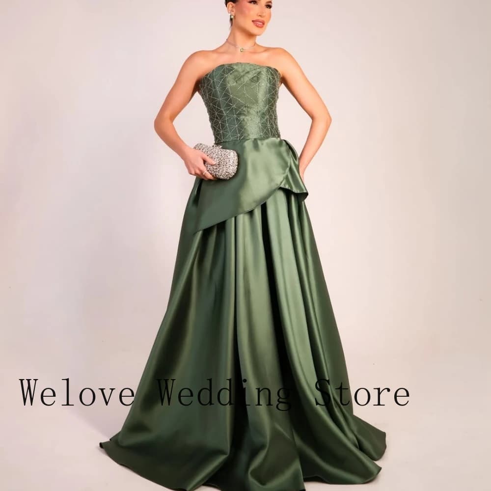 Formal Evening Dress with Strapless Neckline Beaded Embellished Bodice Asymmetric Waist Detail Voluminous Satin Ball Gown Skirt