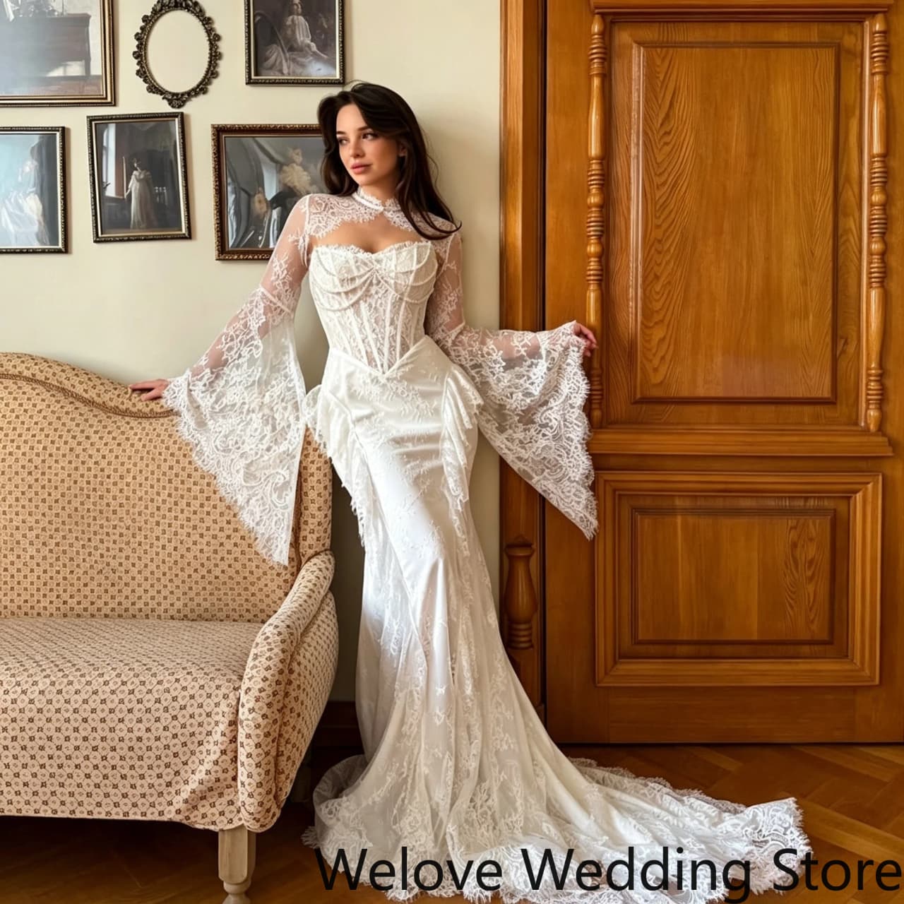 Elegant vintage‑style white mermaid wedding dress with high‑neck sheer lace panel, dramatic oversized flared bell long sleeves