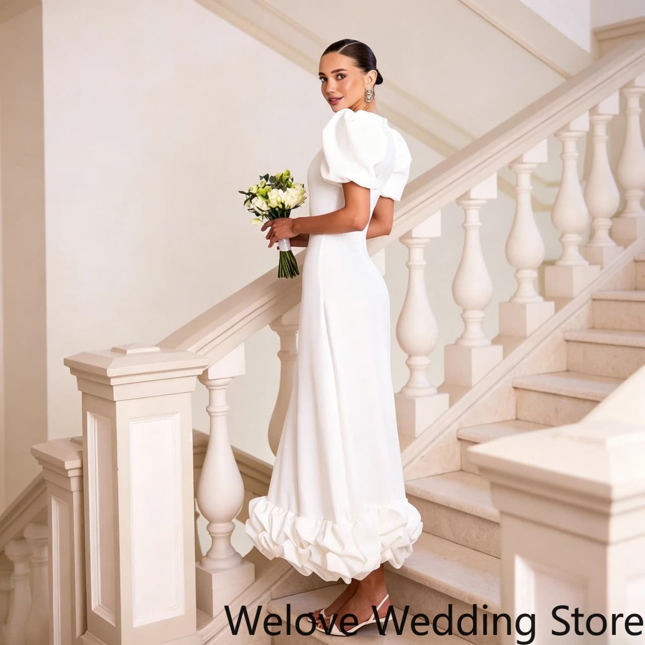 Elegant White Modern Wedding Dress featuring voluminous puff sleeves, a sleek fitted bodice, and a unique ruffled hem